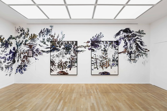 View of the exhibition Signs and Wonders by Abdelkader Benchamma. The artist's added painted branching emerging of his artworks on the wall.